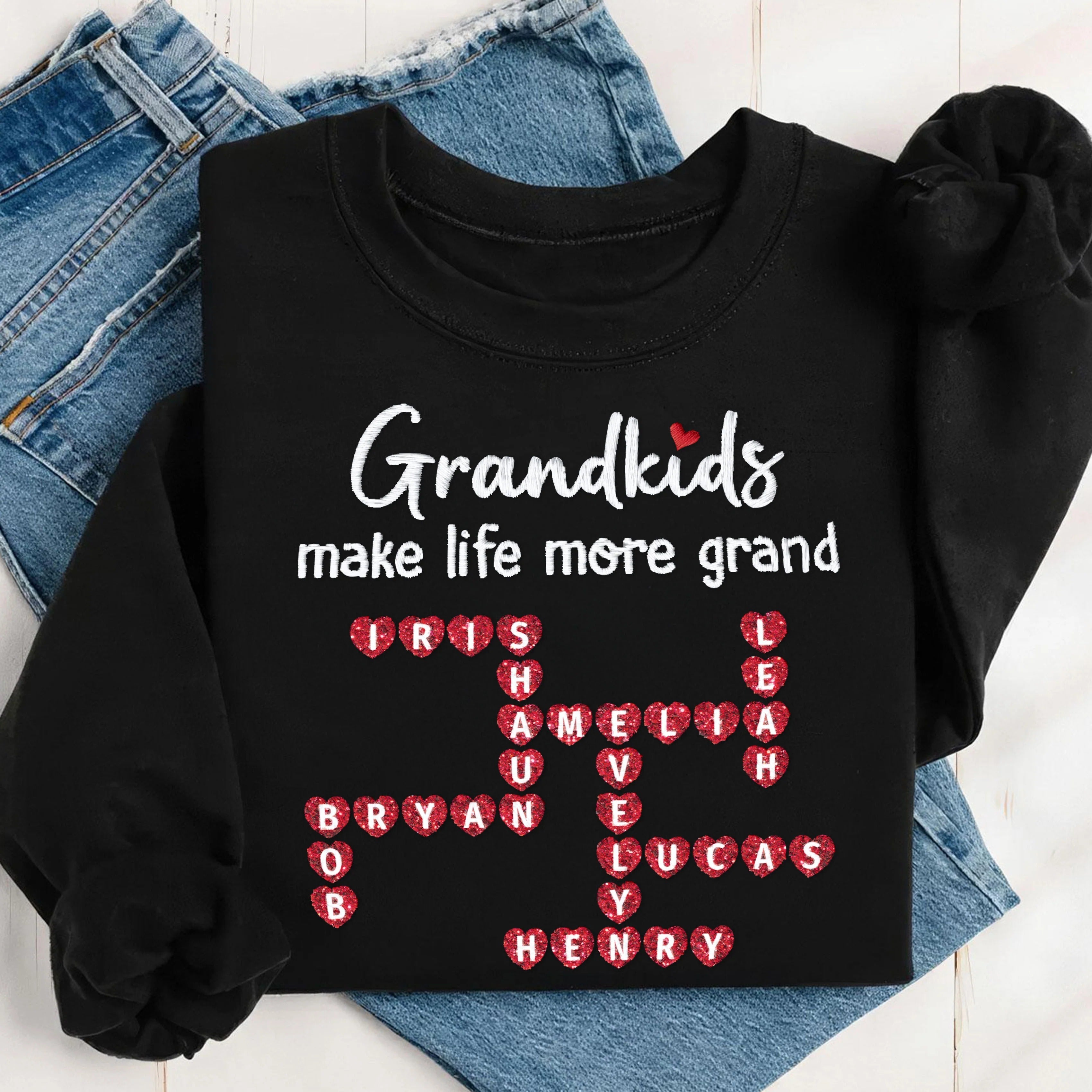 Grandkids Make Life More Grand Crossword Puzzle Art Personalized Black Glitter Embroidery Sweatshirt, Gift For Grandma